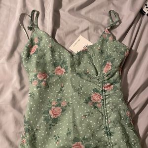 Long dress from Hello Molly. Long slip on the side. Never worn